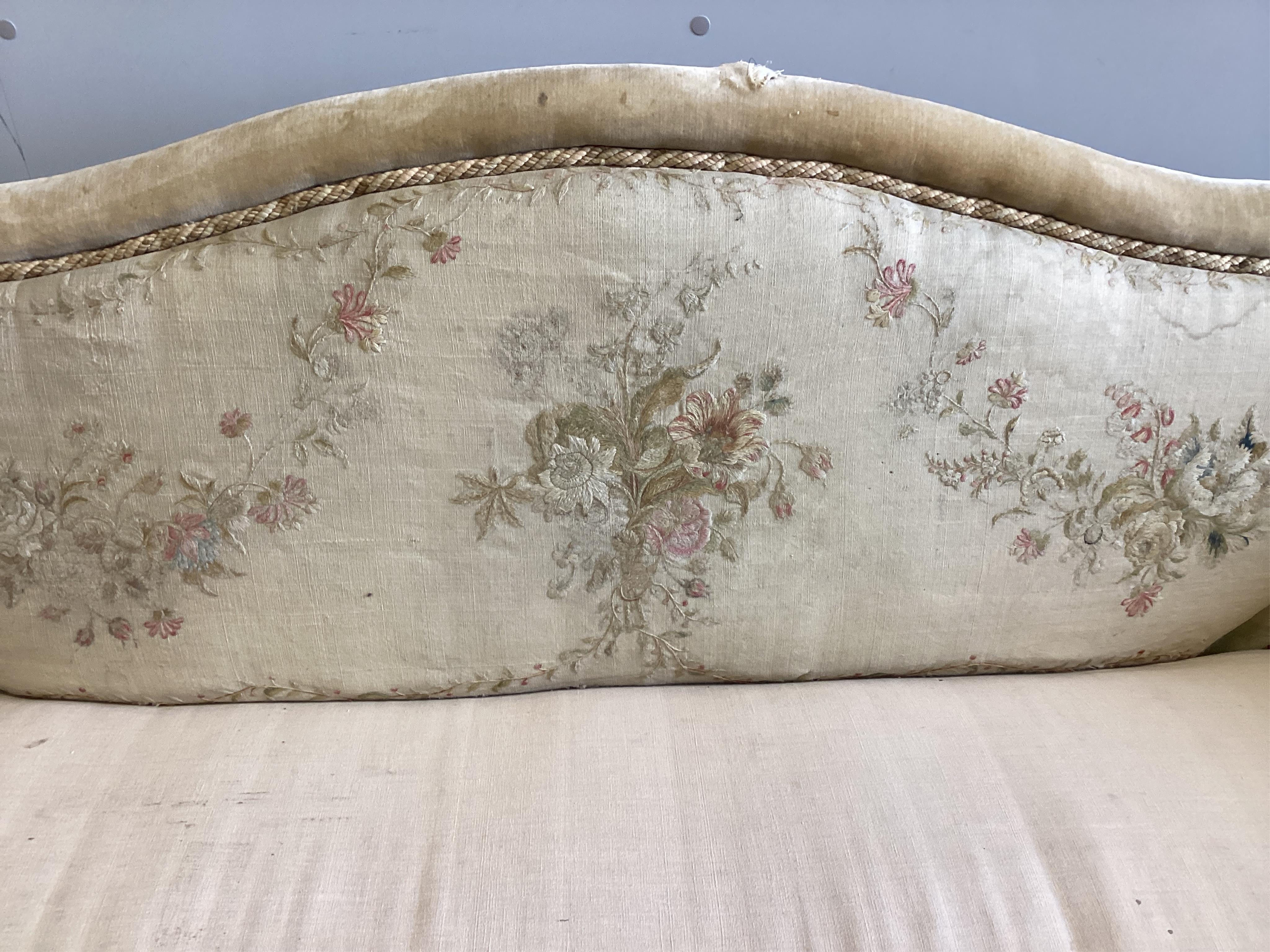 An early 20th century Aubusson style upholstered settee, width 240cm, depth 80cm, height 88cm. Condition - fair